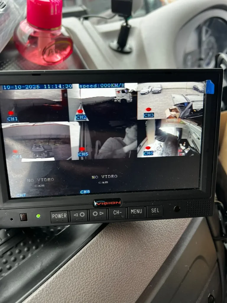 Six-channel MDVR monitor displaying multiple live camera feeds inside an HGV cab